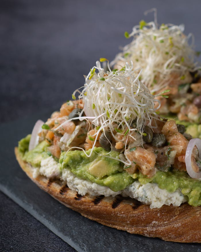 Close-Up Shot of Avocado Toast on Gray Surface